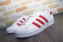 tenis adidas listra vermelha