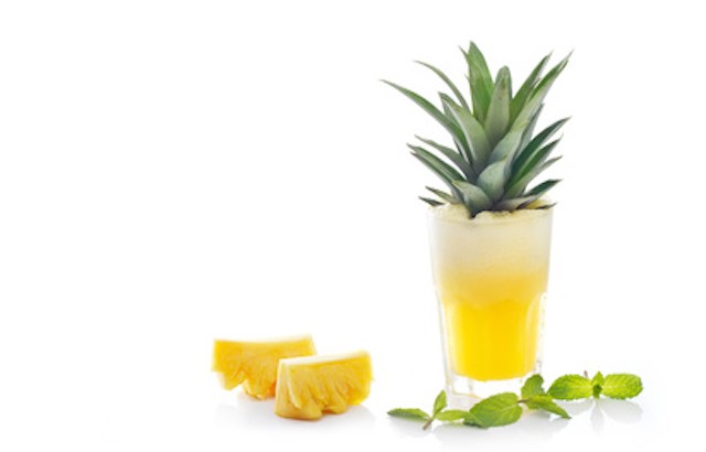 Detox diet, Detox water, pineapple juice and mint  with raw pineapple on white background